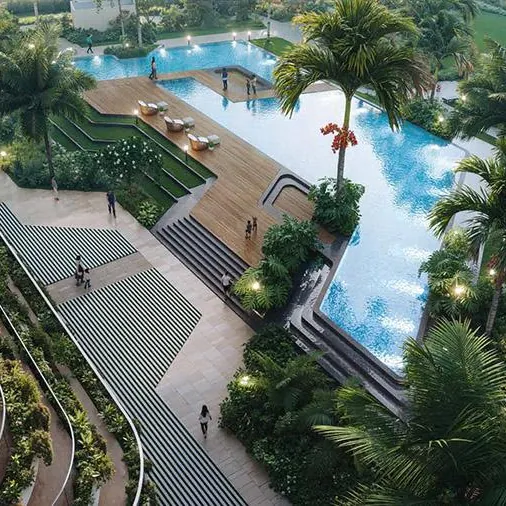 Aratt Ayatana Residences, artistic impression The swimming pool with a timber deck and loungers among palms
